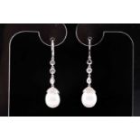 A pair of diamond and pearl drop earrings, collet-set with rose-cut diamonds, above white cultured