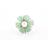 A 14k yellow gold, pearl, and green hardstone flowerhead ring, set with pear-cut stones, size O, 5.6