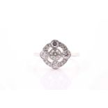 A platinum and diamond cluster ring,set with five collet-set round-cut diamonds, the border set with