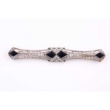 An early to mid 20th century diamond and sapphire bar brooch, the openwork mount set with old-cut