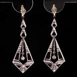 A pair of Art Deco style diamond and onyx drop earrings, the kite-shaped drops inset with shaped