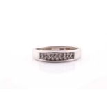 A platinum and diamond ring, the shank pave-set with eighteen round-cut diamond accents, size N 1/