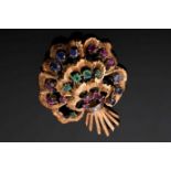 An Italian yellow old floral bouquet brooch set with mixed round-cut rubies, sapphires, and