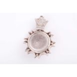 An Indo Persian rock crystal and white metal pendant, with crown shape suspension ring bearing