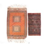 A 20th-century tribal bedding/pillow bag with soumak worked banded decoration. Together with a small