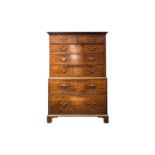 A George III mahogany chest on chest. With dentil moulding above two short over three long