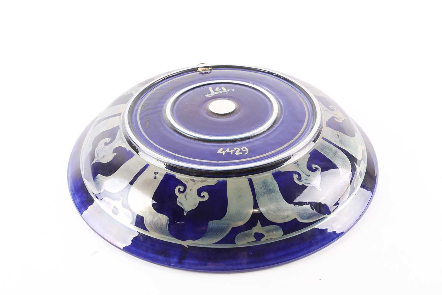 A contemporary Arts & Crafts style blue lustre charger, in the manner of John Pearson, the well with - Image 3 of 4