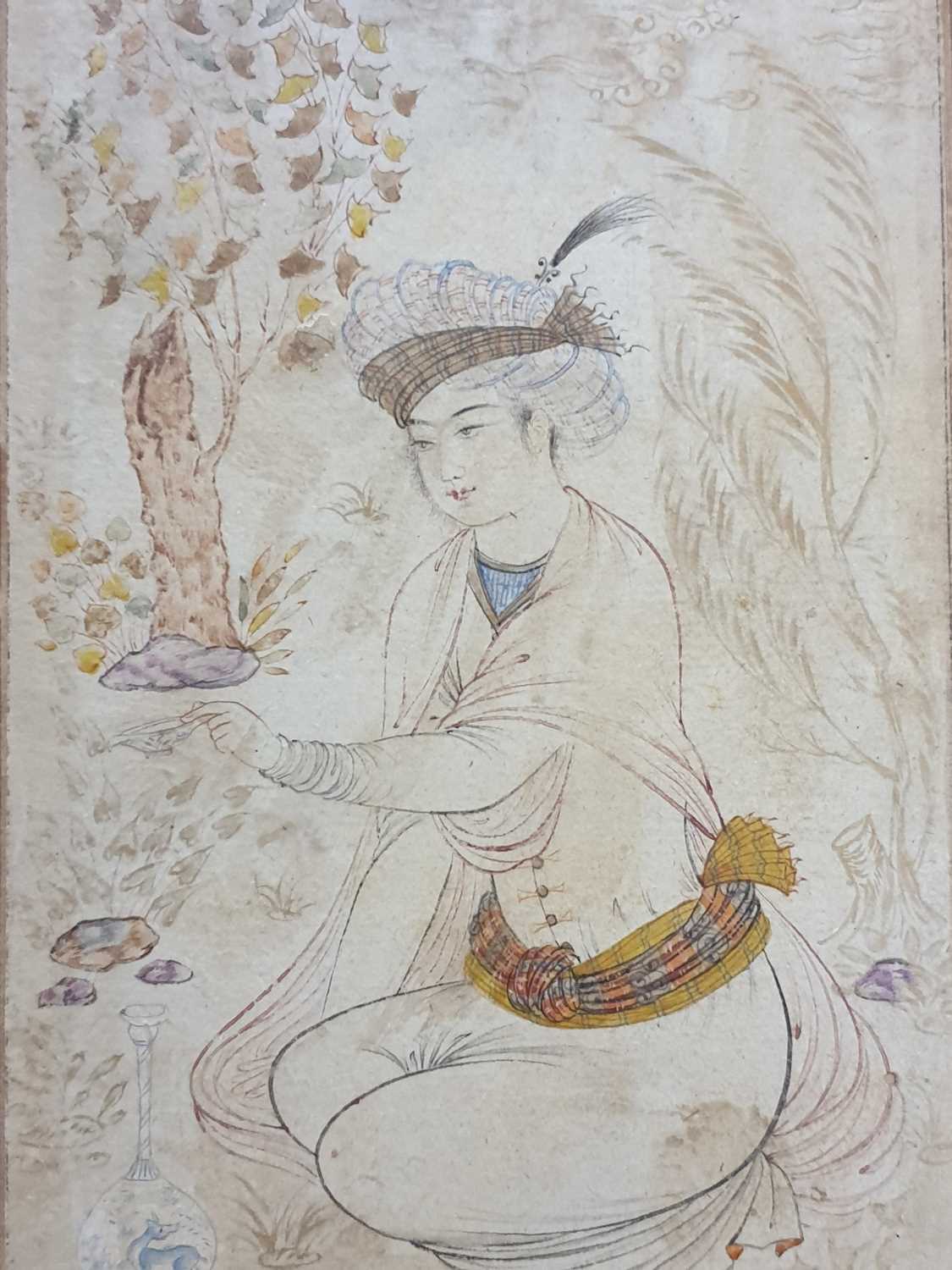 Mughal school, 19th century, a nim qalam pen and coloured ink Prince in a garden, kneeling whilst - Image 5 of 7