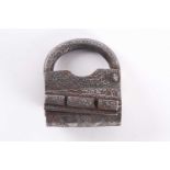 A Persian heavy steel padlock, Qajar Dynasty. Profusely engraved with Arabic text and islimi