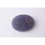 A Roman-style carved amethyst glass oval Intaglio bracelet panel, decorated with a charioteer.