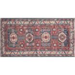 A Late 19th century/early 20th-century "Suruhani Garden" Shirvan rug with four rectangular