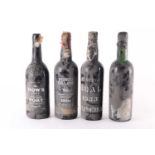 A bottle of 1953 Reserva Boal Madeira, together with a 1977 Dow's Silver Jubilee Vintage Port, a