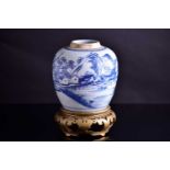 A Chinese blue & white ginger jar, Qing, Qianlong period, painted with a continuous landscape of