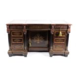 A 19th century French Empire brass inlaid ebonized and mahogany inverted breakfront bureau