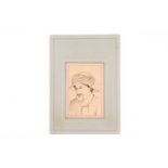 Indo/Persian school, 20th century, portrait of a bearded man, pen and ink, laid onto card, image