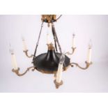 A French Empire style gilt brass and Japaned iron six sconce electrolier. Each branch with a faux