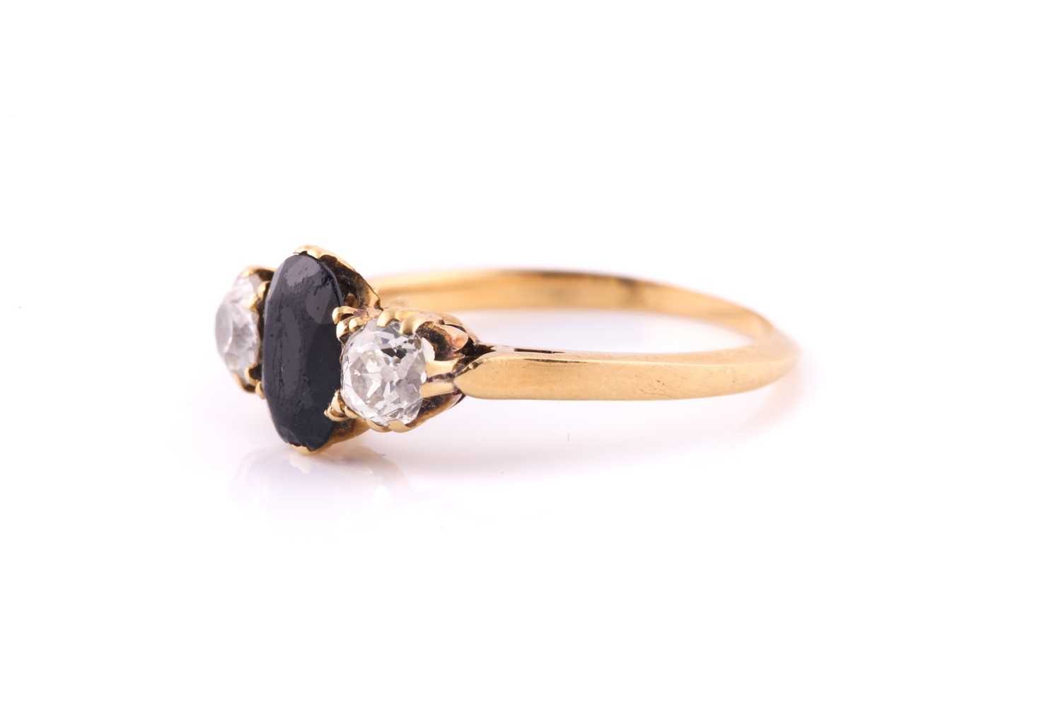 An Edwardian sapphire and diamond three-stone ring the oval-shaped sapphire within a six-claw - Image 3 of 5