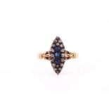 A late Victorian sapphire and diamond lozenge-shaped cluster ring; the centre set with three mixed