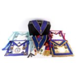 A collection of Masonic regalia including a Royal arch apron and collar with trinitarian device. A
