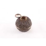 A 19th-century white metal incense burner, of ball form with filigree work decoration, 10 cm high,