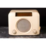 A Bush DAC 90 A vintage valve radio, circa 1950's, in a cream bakelite case, 30.8cm wide, 23cm highA