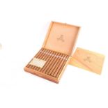 A boxed set of 25 Montecristo 'A' Havana cigars, with (opened) card sleeve.Condition report: