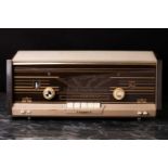 A Philips vintage valve radio, model B 4 X 12 A, circa 1960's, in a brown and cream plastic case