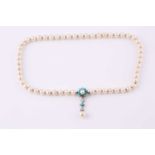 A single strand cultured pearl necklace, light cream, graduated from 6.5 to 7mm diameter,