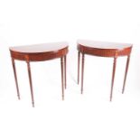 A pair of George III style figure mahogany demi lune console tables, 20th century, with