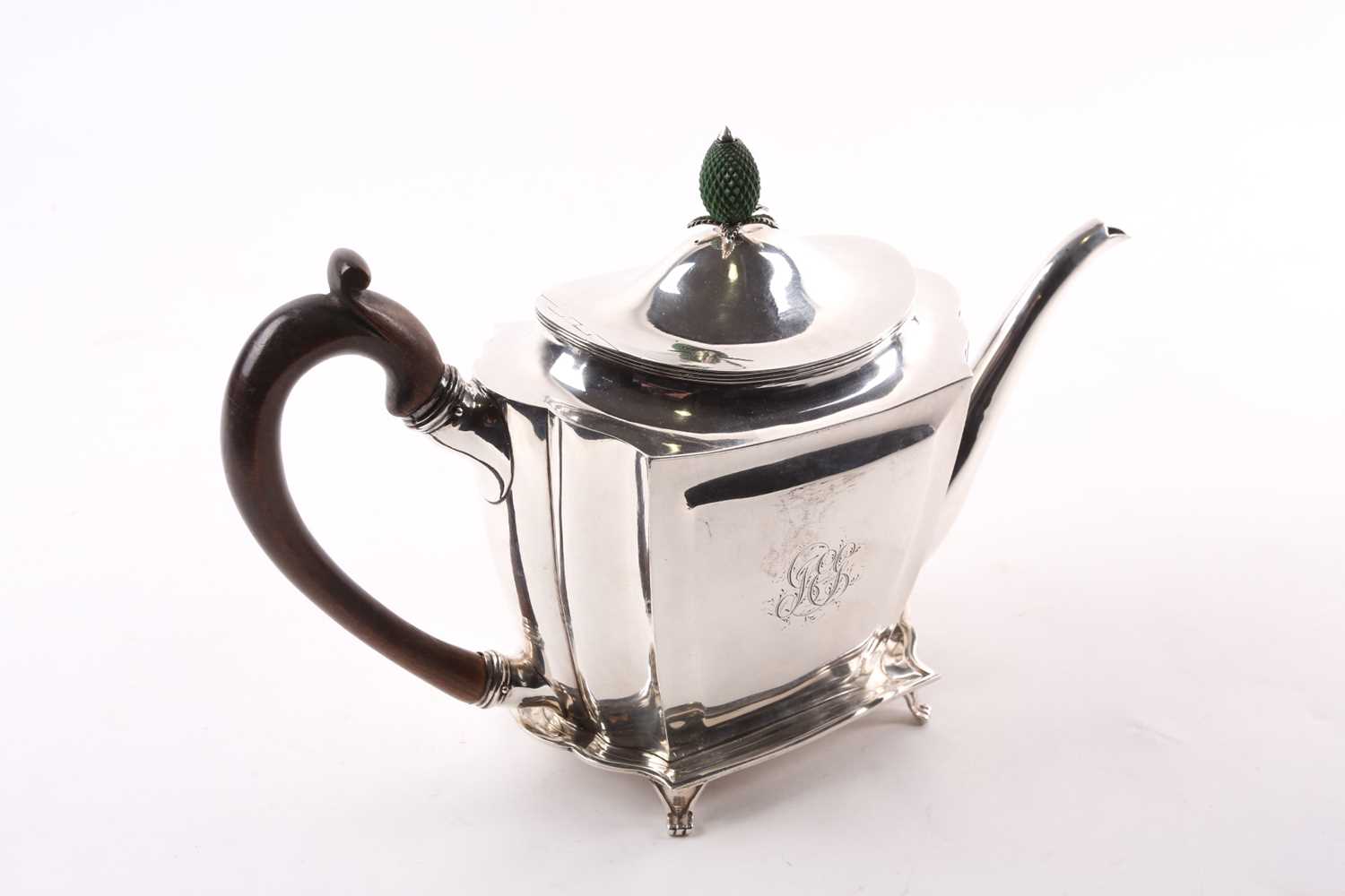 A George III teapot on conforming stand, London 1798 by Charles Chesterman II, the teapot with green