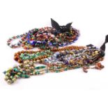 A collection of Victorian foil beads Comprising of 19 coloured bead necklaces, some to string