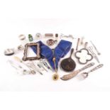 A mixed collection of silver plated items, together with a silver hand mirror and others.