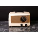 An Emerson model 543 vintage tube radio, circa 1947, in glossy ivory colour Plaskon case, the