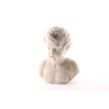 A late 19th or early 20th century white marble bust of a boy, 22 cm high x 17 cm wide.