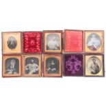 A collection of six Victorian leather-cased ambrotypes, to include one of a child, the largest