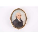 19th-century school, a portrait miniature on ivory, depicting a finely dressed gentleman, 7 cm x 5.5
