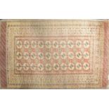 An old brick red ground Tekke Turkoman Turkoman rug 204 cm x 128 cm. Together with a Qashqai style