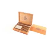 A boxed set of 25 H. Upmann 'Sir Winston' Havana cigars, with (opened) card sleeve.Condition report: