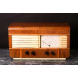 A vintage GJC valve radio, early to mid 20th century, short wave, battery operated, in walnut