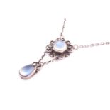 A moonstone Arts and crafts pendant necklace The trace-link chain suspending a foliate pendant,