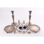 A set of six silver cruets, London 1940 by Edward Barnard and Sons, together with two silver knife