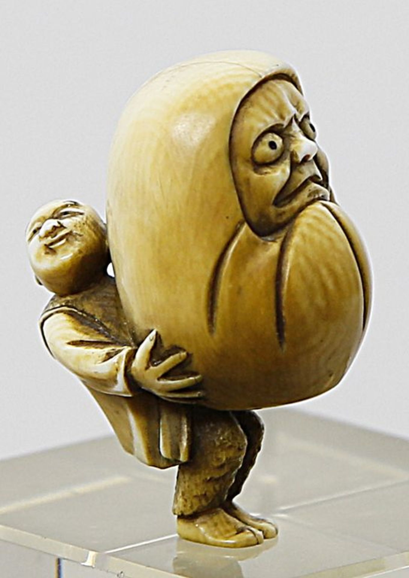 Netsuke "Mann mit Daruma".