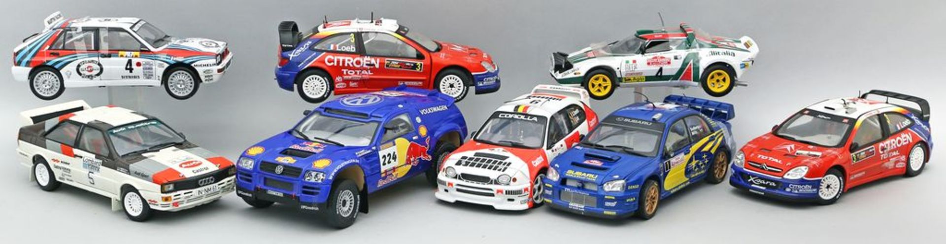 8 Modellautos von Rallyewagen.
