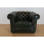 Groen lederen clubfauteuil