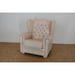 Cremelederen oorfauteuil