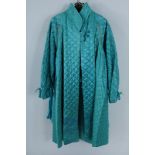 Fong Leng, turqouise mantel, rok, blouse