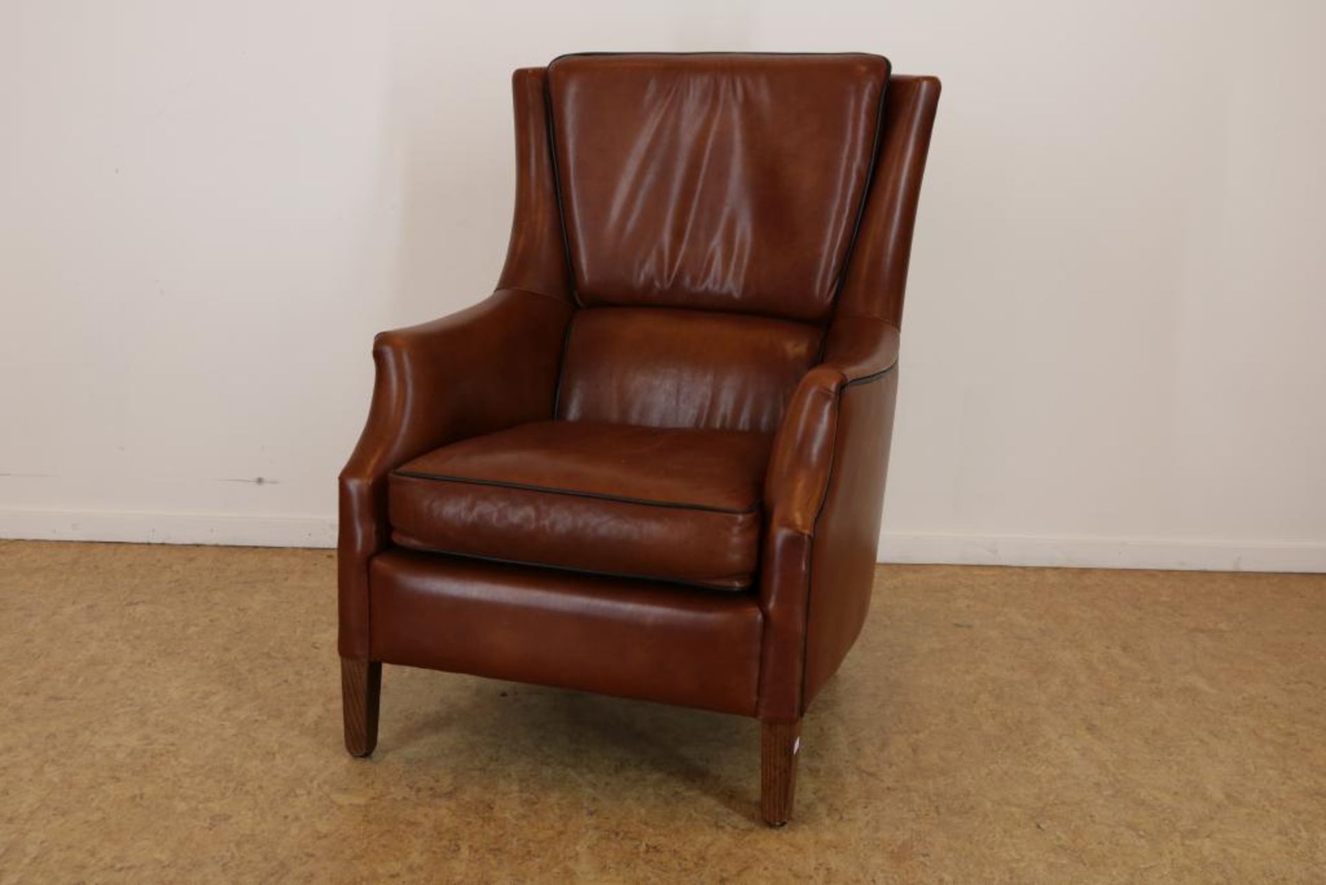 Bruinlederen armfauteuil