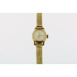 Geelgouden dames horloge, Prisma