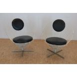 Stel wit metalen design stoelen