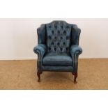 Blauw lederen oorfauteuil